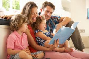 parents reading books to kids